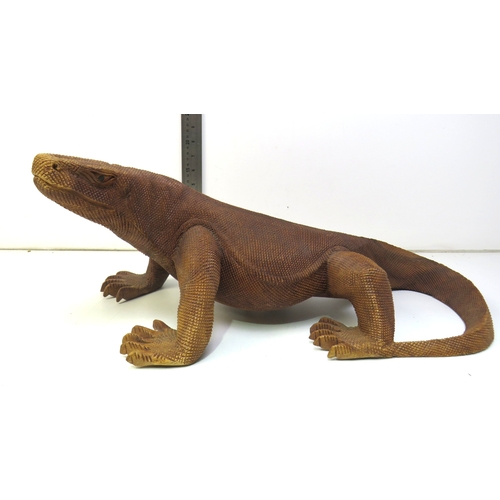 12 - A large hand carved wooden sculpture of a Komodo Dragon.
