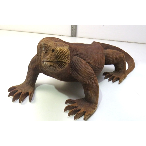 12 - A large hand carved wooden sculpture of a Komodo Dragon.