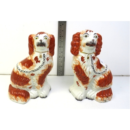 38 - A pair of Victorian Staffordshire pottery Spaniel dogs.
