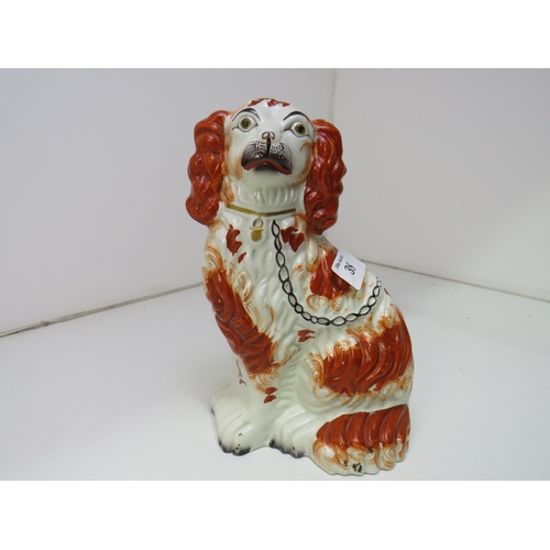 38 - A pair of Victorian Staffordshire pottery Spaniel dogs.