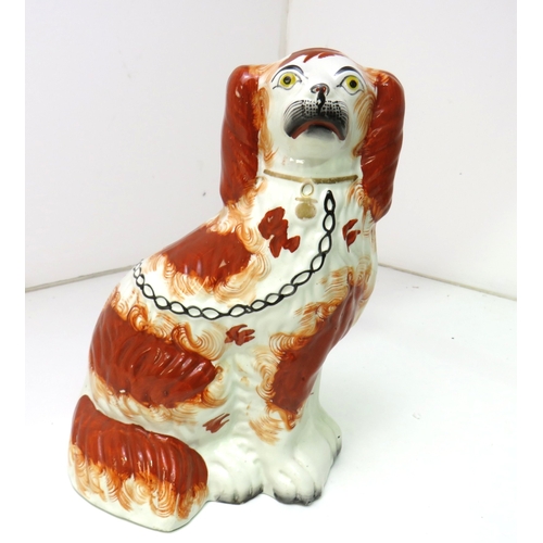 38 - A pair of Victorian Staffordshire pottery Spaniel dogs.