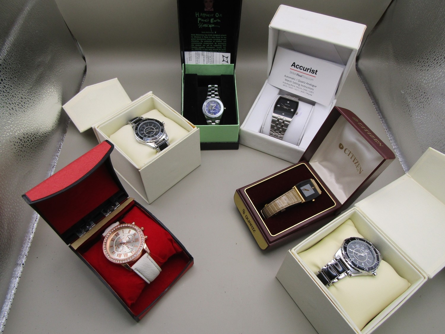 Six boxed watches