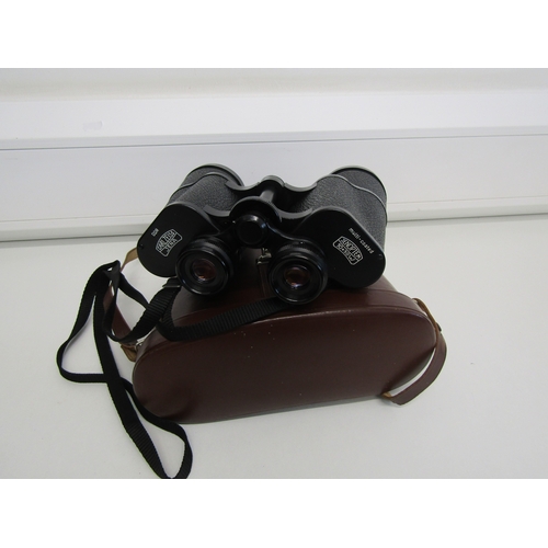 7 - Vintage Carl Zeiss Jenoptem binoculars with carrycase.
