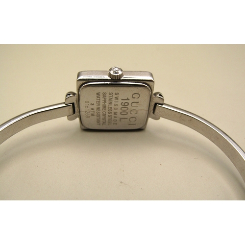 8 - Ladies Gucci bangle watch.