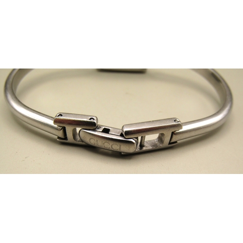 8 - Ladies Gucci bangle watch.