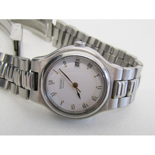 13 - Two Seiko Kinetic watches.