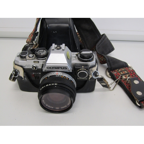 16 - Vintage Olympus OM-10 film camera.