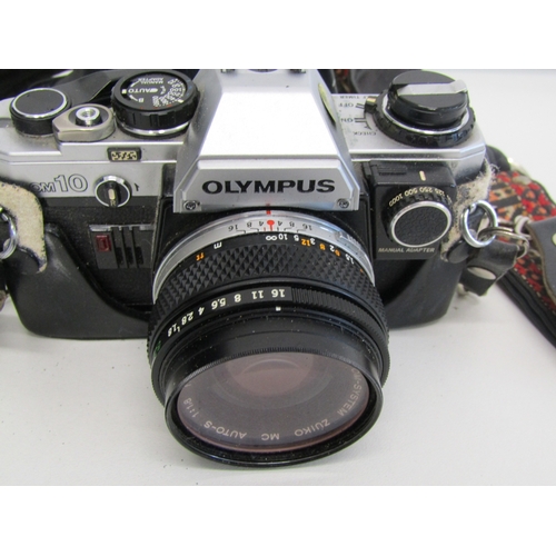 16 - Vintage Olympus OM-10 film camera.