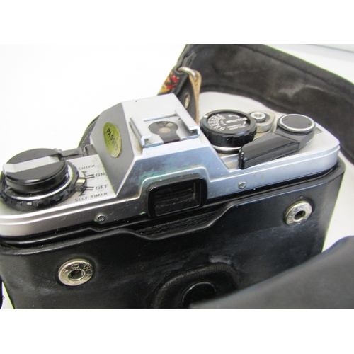 16 - Vintage Olympus OM-10 film camera.