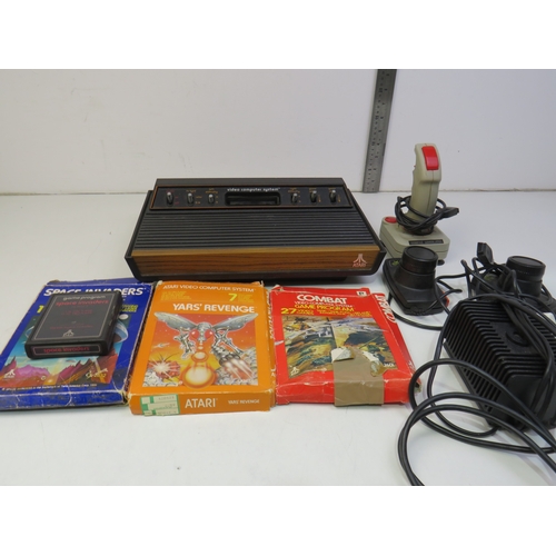 385 - Atari Video computer system and games, including Space invaders, Yar's revenge and Combat