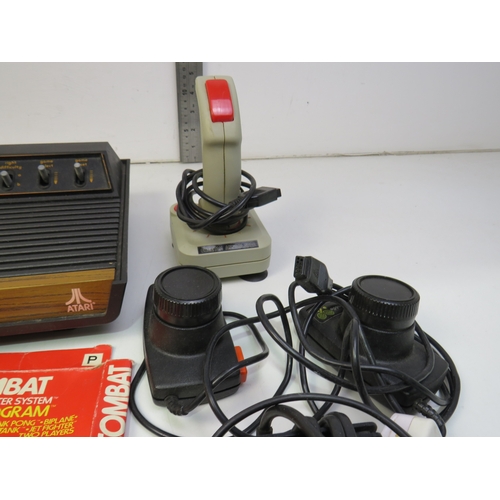 385 - Atari Video computer system and games, including Space invaders, Yar's revenge and Combat