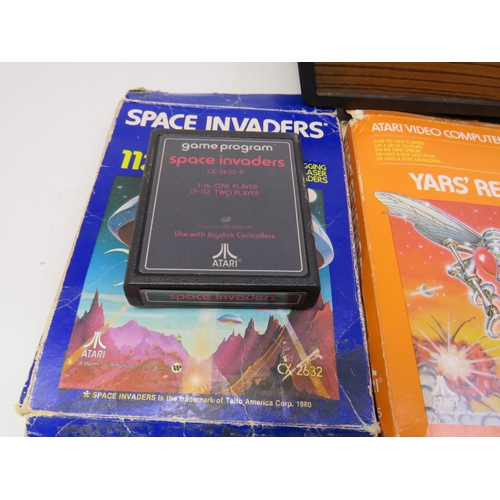 385 - Atari Video computer system and games, including Space invaders, Yar's revenge and Combat