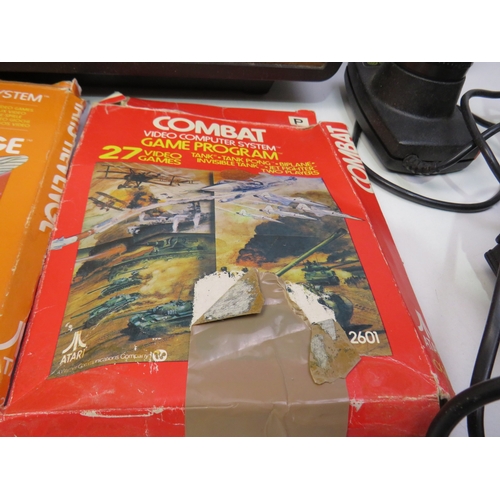 385 - Atari Video computer system and games, including Space invaders, Yar's revenge and Combat