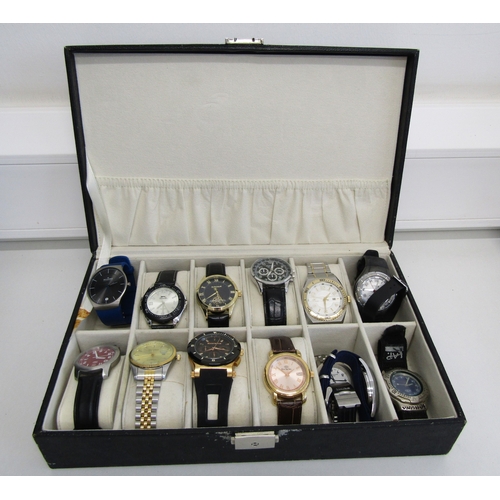 33 - Watch display box with twelve watches.