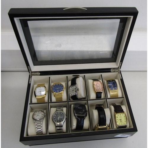 23 - Watch display box with twelve watches.
