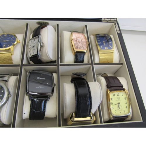 23 - Watch display box with twelve watches.