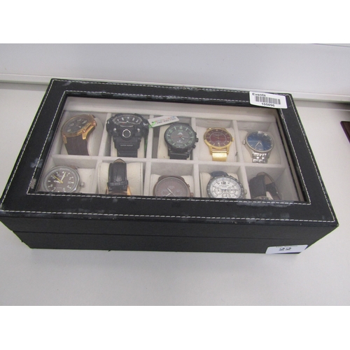 22 - Watch display box with twelve watches.
