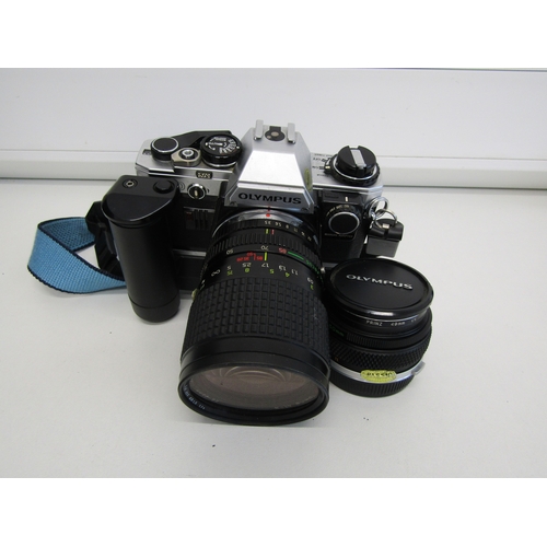 28 - Vintage Olympus OM-10 SLR camera with Prinz zoom lens.