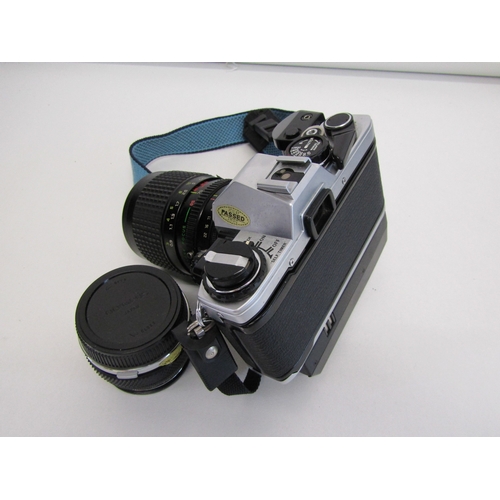 28 - Vintage Olympus OM-10 SLR camera with Prinz zoom lens.