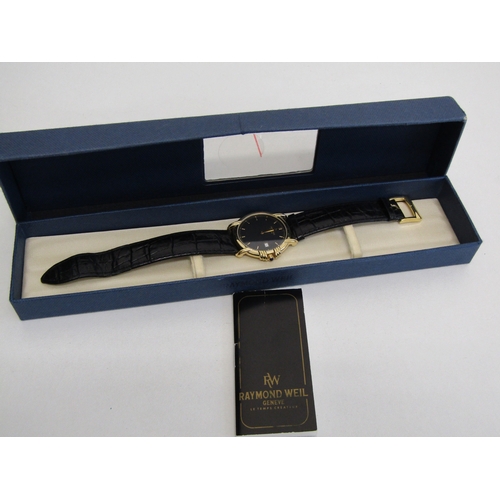 35 - Raymond Weil Geneve watch with box and paperwork.