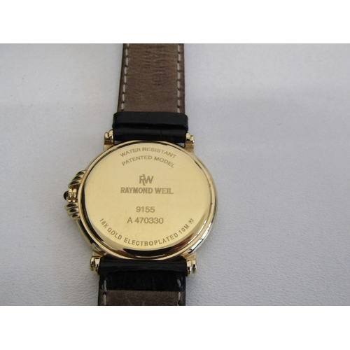 35 - Raymond Weil Geneve watch with box and paperwork.