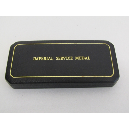 31 - Boxed Imperial Service medal to Charlie Green.