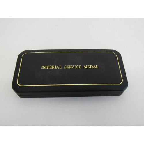 24 - Boxed Imperial Service medal with paperwork to John William Bower.