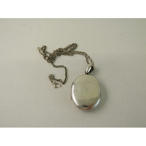 54 - Sterling Silver chain and locket 15 grams.