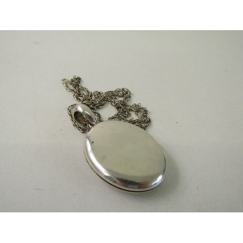 54 - Sterling Silver chain and locket 15 grams.
