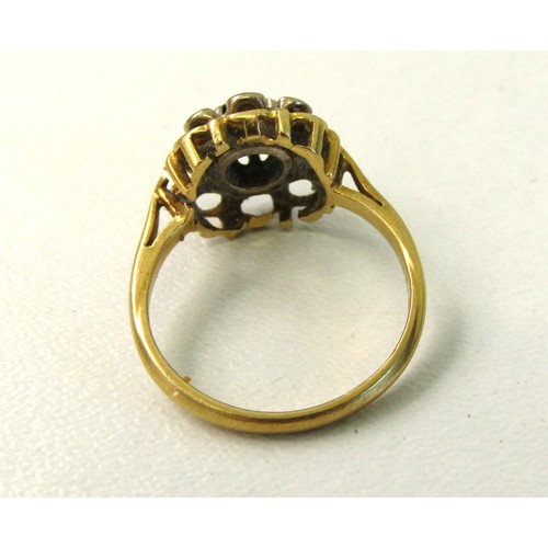 51 - 18ct gold cluster ring size M
Weight 3.8g.