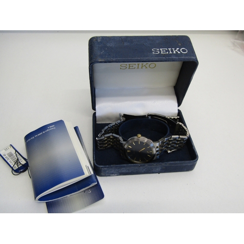 42 - Mens Seiko watch boxed with papers.