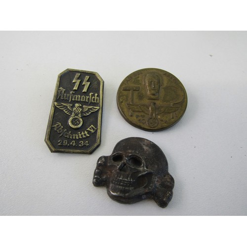 168 - German Third Reich items, including a day badge, SS totenkopf and SS tinnie