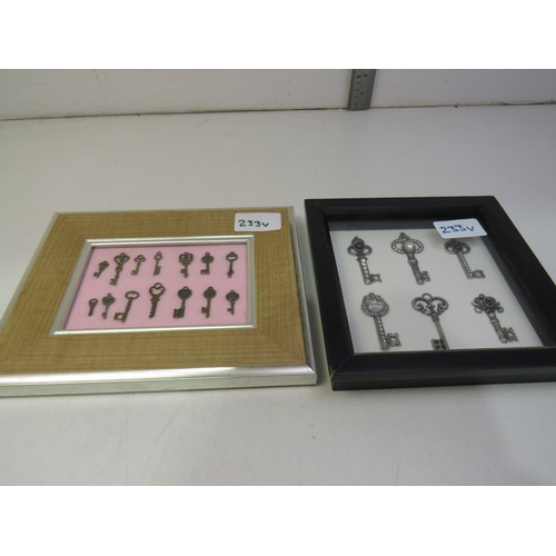 233V - Two framed sets of ornate keys