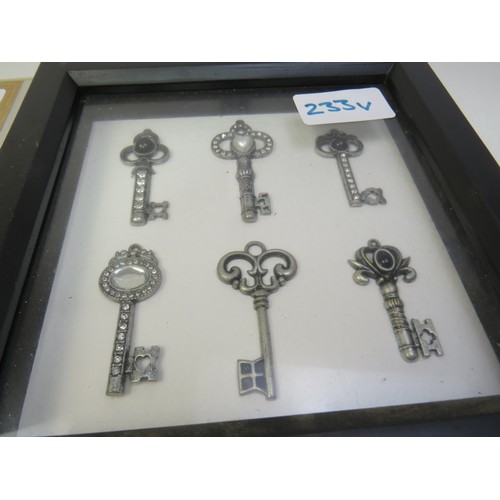 233V - Two framed sets of ornate keys