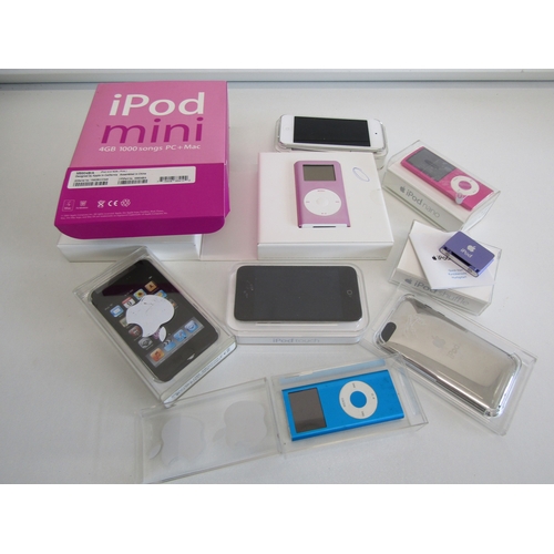 74 - Retro Apple iPod collection includes boxed iPod Mini, iPod Shuffle, iPod nano etc - untested.