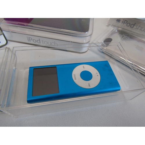 74 - Retro Apple iPod collection includes boxed iPod Mini, iPod Shuffle, iPod nano etc - untested.