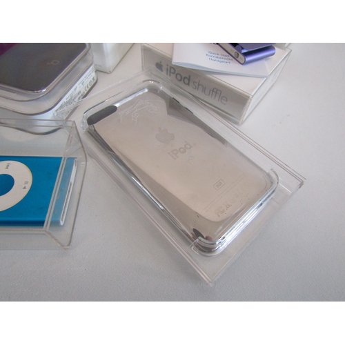 74 - Retro Apple iPod collection includes boxed iPod Mini, iPod Shuffle, iPod nano etc - untested.