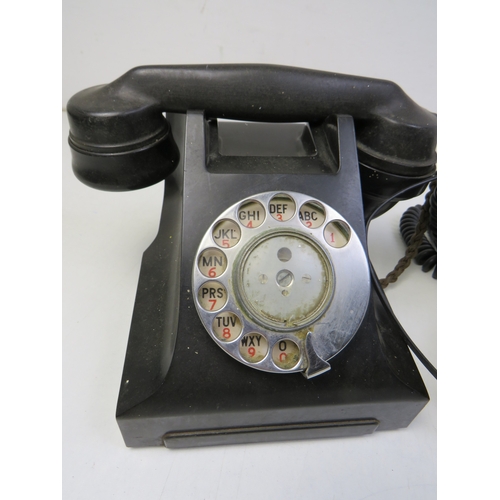291 - Two vintage rotary dial telephones.