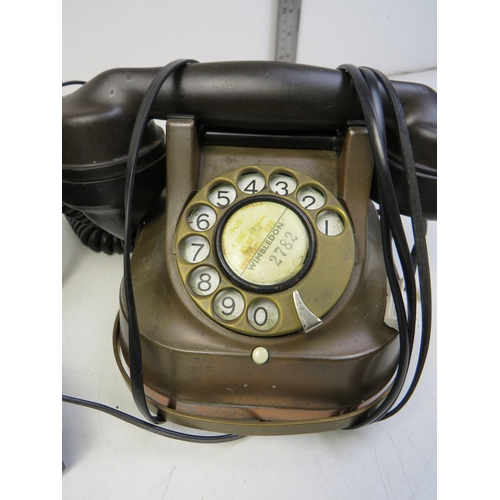 291 - Two vintage rotary dial telephones.