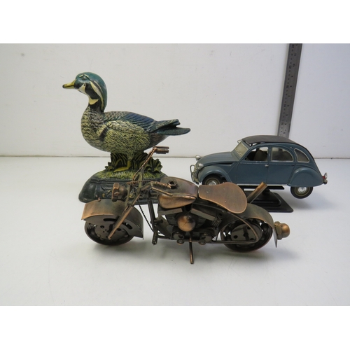 292 - Cast iron duck doorstop, metal model motorbike and car.