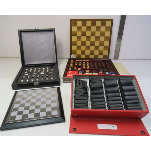Chess sets and case of projector slides.