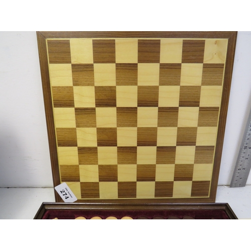 Chess sets and case of projector slides.