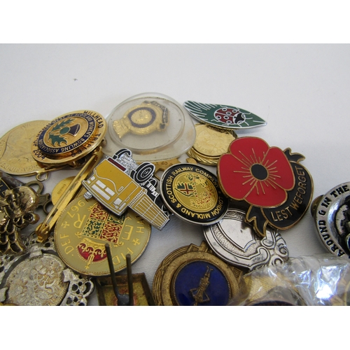 70 - A collection of mixed badges, pins and fobs.