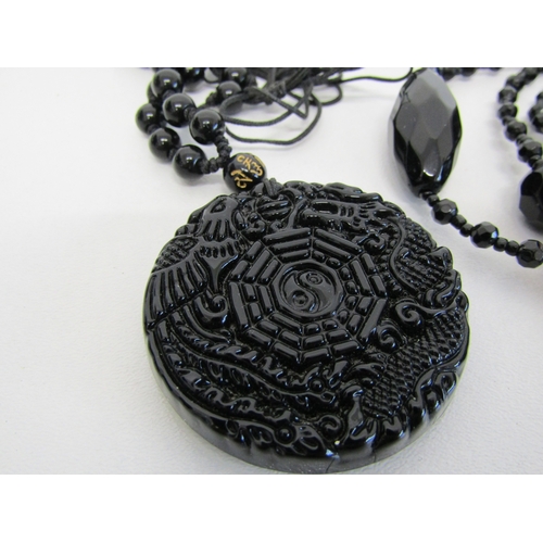 76 - Vintage long black glass/French jet bead necklace and black obsidian yin yang pendant necklace.