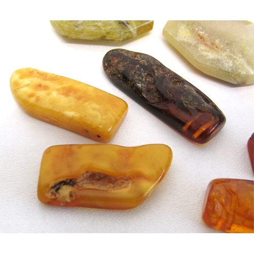 71 - A collection of natural amber large size beads and large dendritic agate beads.