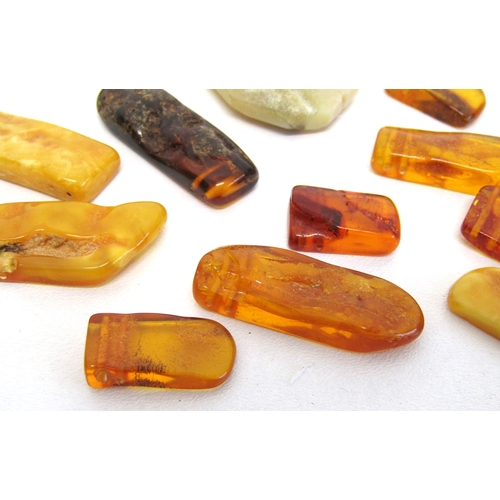 71 - A collection of natural amber large size beads and large dendritic agate beads.