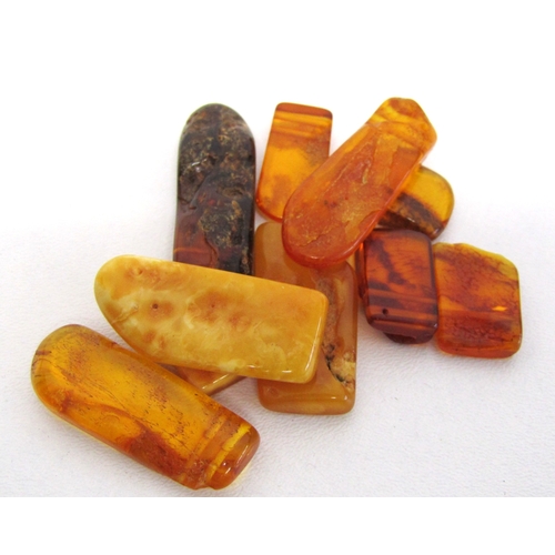71 - A collection of natural amber large size beads and large dendritic agate beads.