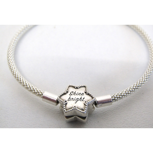 77 - Genuine Pandora bracelet and a collection of nine silver charms including opening.