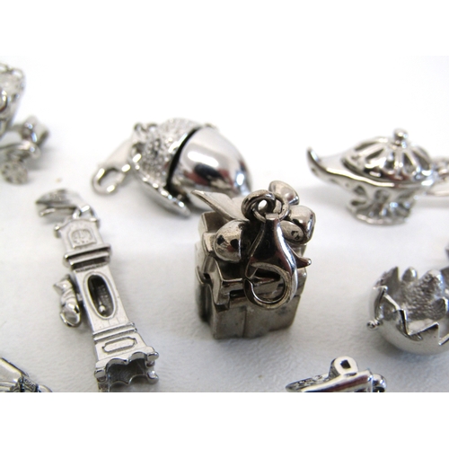 77 - Genuine Pandora bracelet and a collection of nine silver charms including opening.