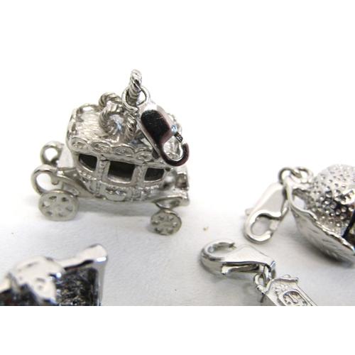 77 - Genuine Pandora bracelet and a collection of nine silver charms including opening.